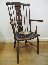 Appraisal: EDWARDIAN SPINDLE BACK ARMCHAIR