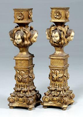 Appraisal: Pair Italian baroque style pedestals each with four carved heads