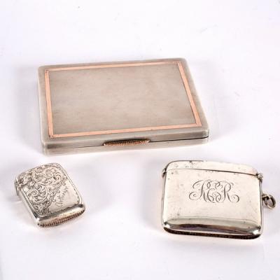 Appraisal: A silver cigarette case WHM Birmingham with yellow metal line