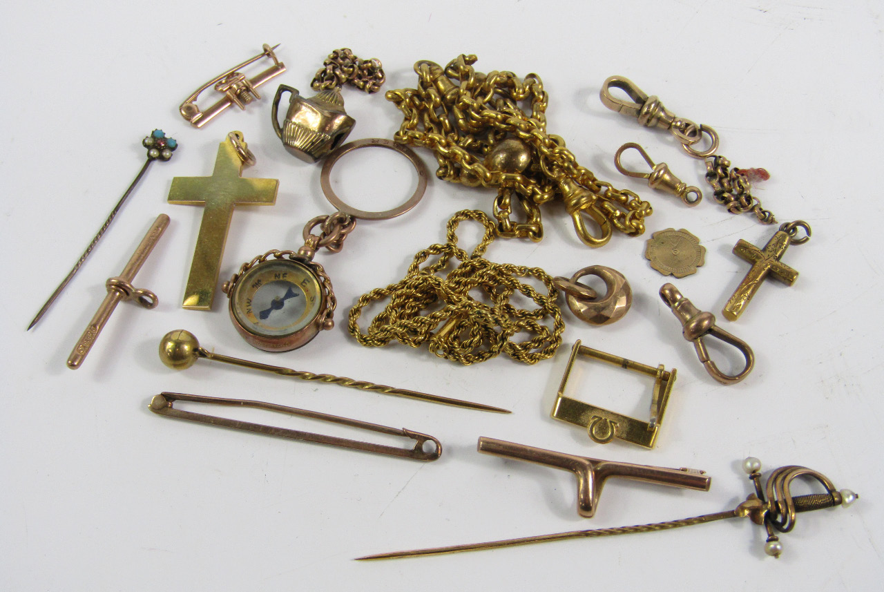 Appraisal: Gold and yellow metal jewellery including charms tie pins and