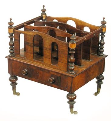 Appraisal: A th century rosewood canterbury with open arched divisions and