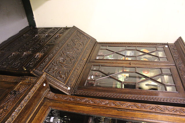 Appraisal: A VICTORIAN DARK OAK BOOKCASE BUREAU with astragal glazed doors