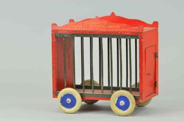 Appraisal: SCHOENHUT '' CAGE WAGON Wooden painted cage in red overall