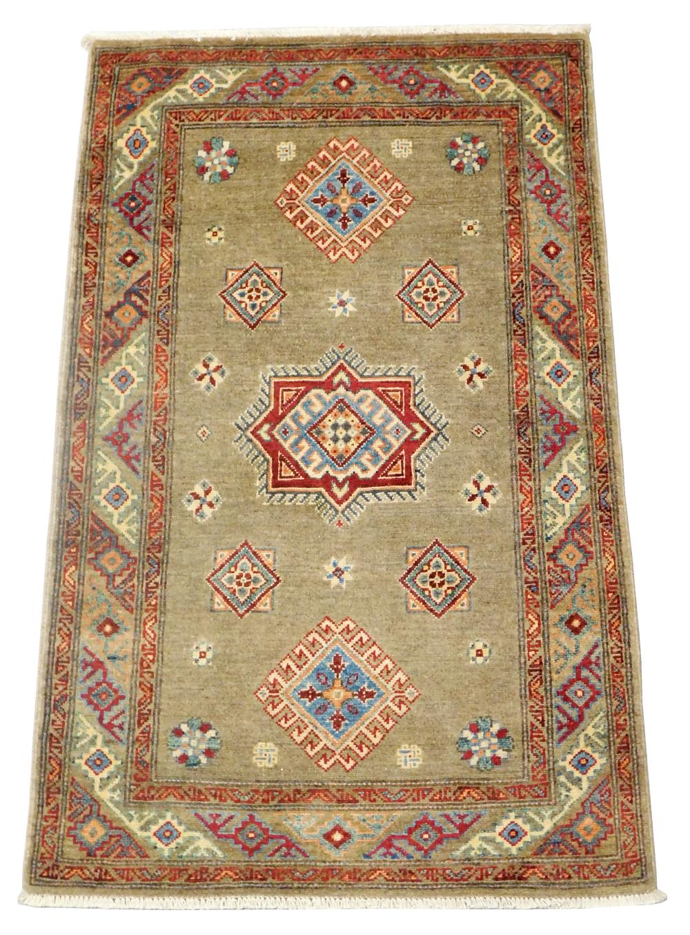 Appraisal: RUG Uzbek Shirivan ' x ' hand-woven wool taupe field