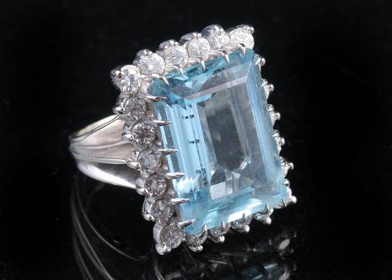 Appraisal: K WHITE GOLD DIAMOND AND AQUAMARINE RING Emerald-cut aquamarine weighing