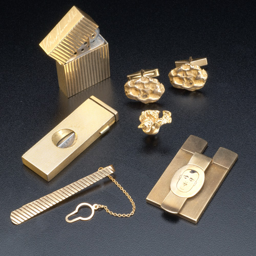 Appraisal: Gentlemen's gold lot k Zippo lighter k tie bar k