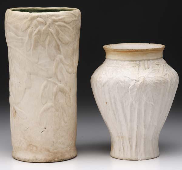 Appraisal: TIFFANY Two vases embossed with foliate designs on white bisque