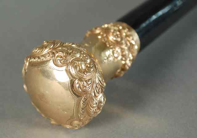 Appraisal: GENTLEMAN'S GOLD HANDLE WALKING STICK American late th early th