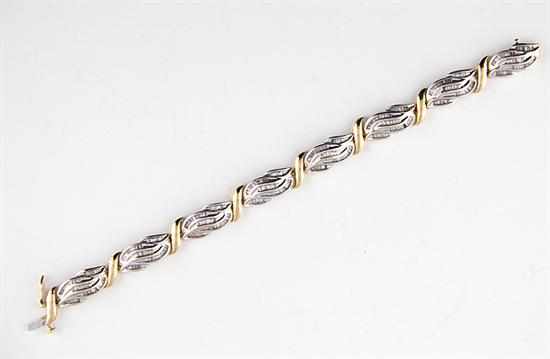 Appraisal: Gold and diamond bracelet K white and yellow gold leaf