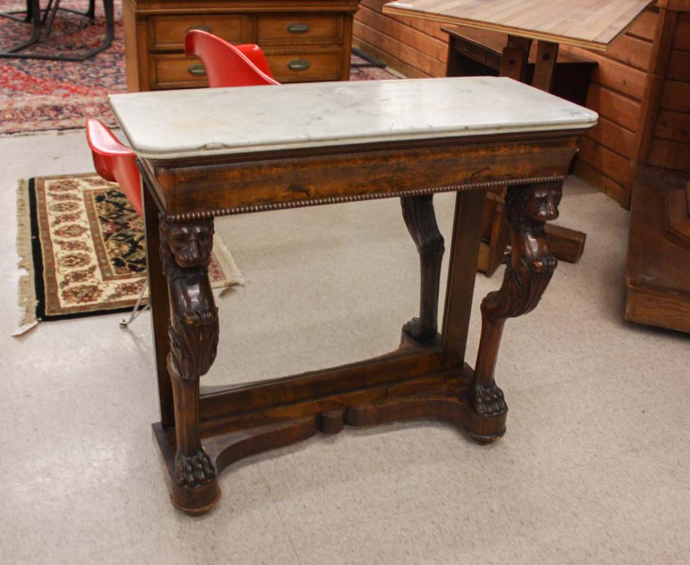 Appraisal: VICTORIAN MARBLE-TOP WALNUT CONSOLE TABLE English th century featuring twin