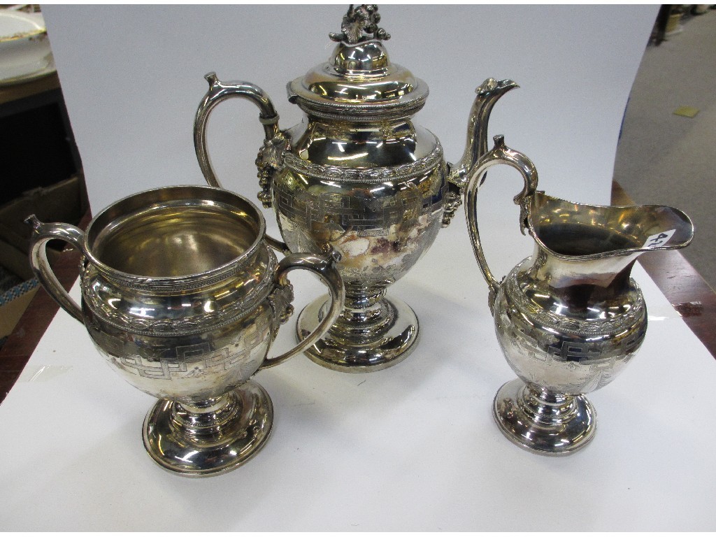 Appraisal: Three piece silver plated tea service with Greek key decoration