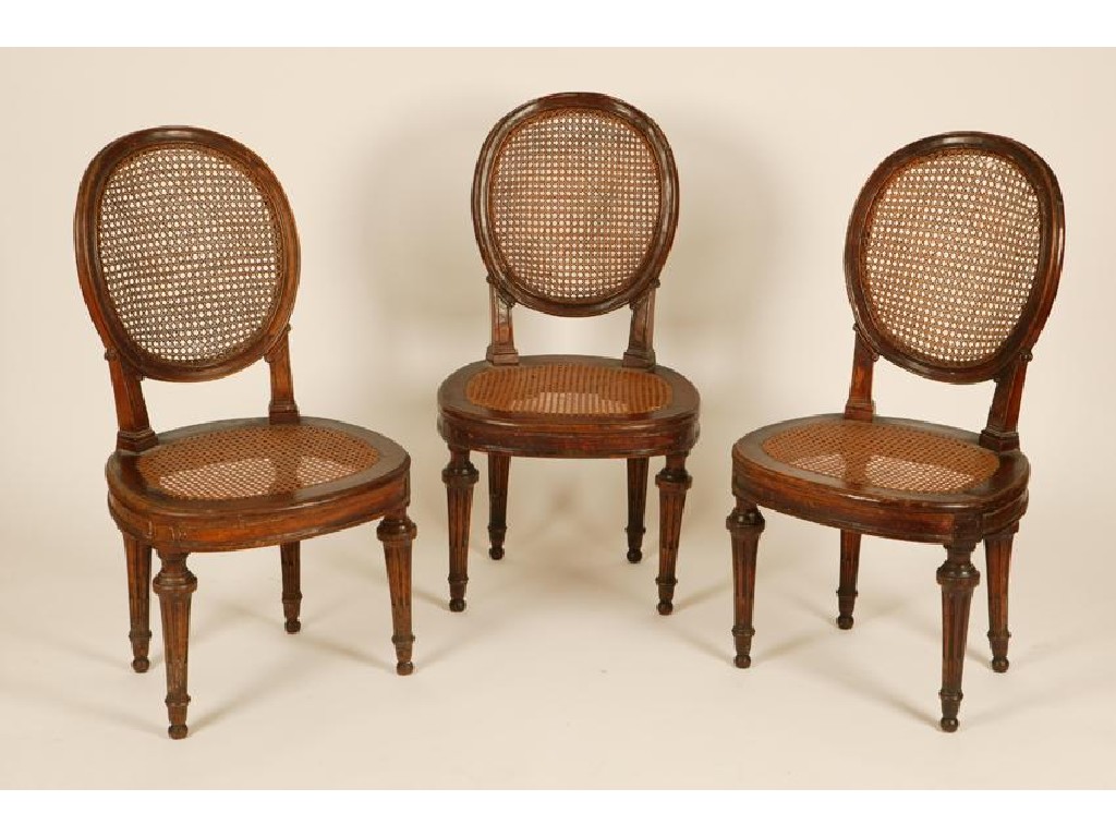 Appraisal: A SET OF THREE LOUIS XVI STAINED BEECH OCCASIONAL CHAIRS