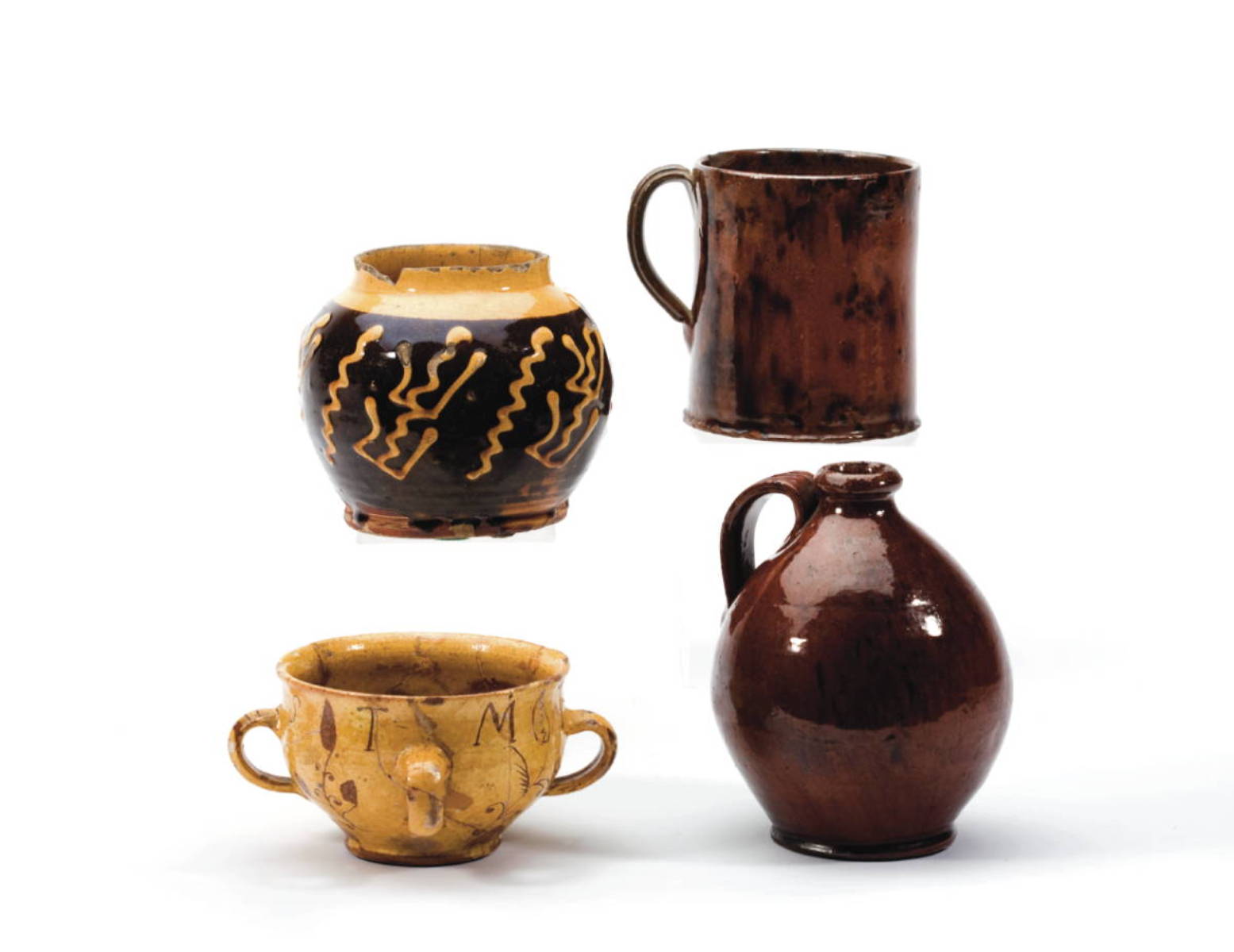 Appraisal: FOUR ENGLISH AND AMERICAN GLAZED REDWARE VESSELS EARLY EIGHTEENTH TO