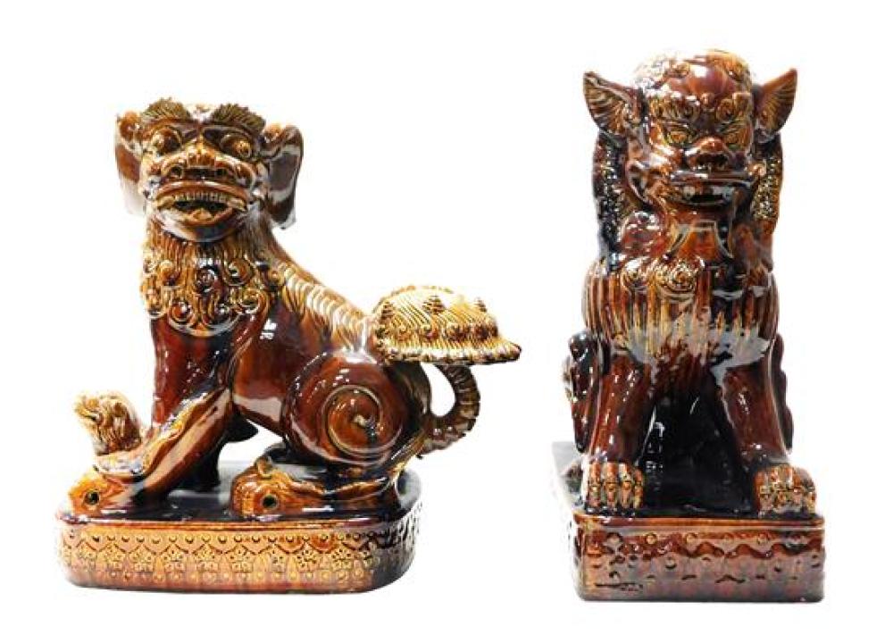 Appraisal: ASIAN Large brown glazed Foo dogs Chinese late th th