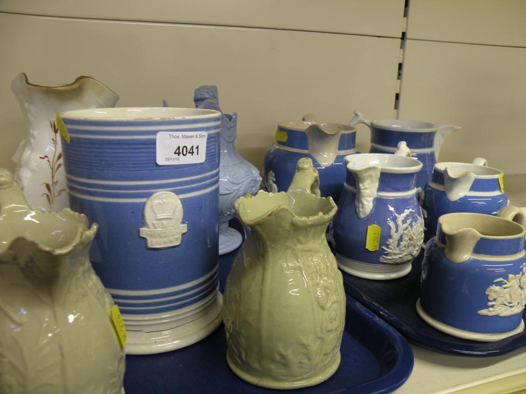 Appraisal: Various Victorian relief moulded jugs and a mug