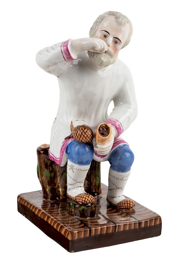 Appraisal: A RUSSIAN PORCELAIN FIGURE OF A BAST SHOE MAKER GARDNER