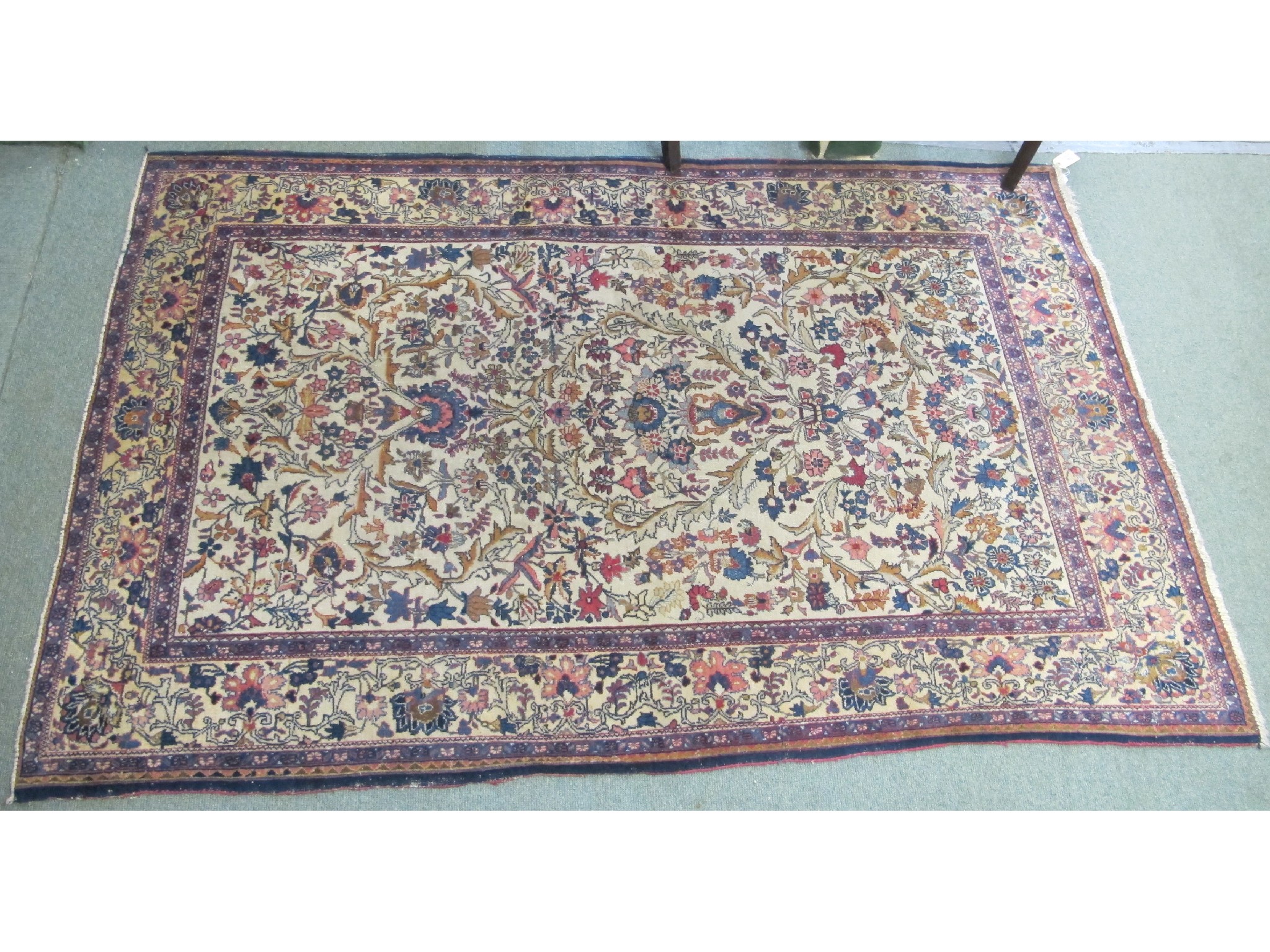 Appraisal: A cream ground Kashan rug x cm