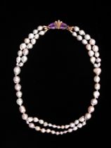 Appraisal: Gray Baroque Pearl Necklace with Amethyst Clasp Gray baroque pearl