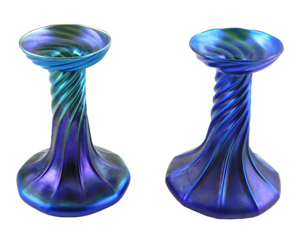 Appraisal: Louis Comfort Tiffany pair of blue Favrile candlesticks raised spiral