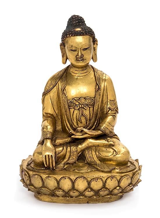 Appraisal: A Sino-Tibetan Gilt Bronze Figure of Shakyamuni Buddha Height inches