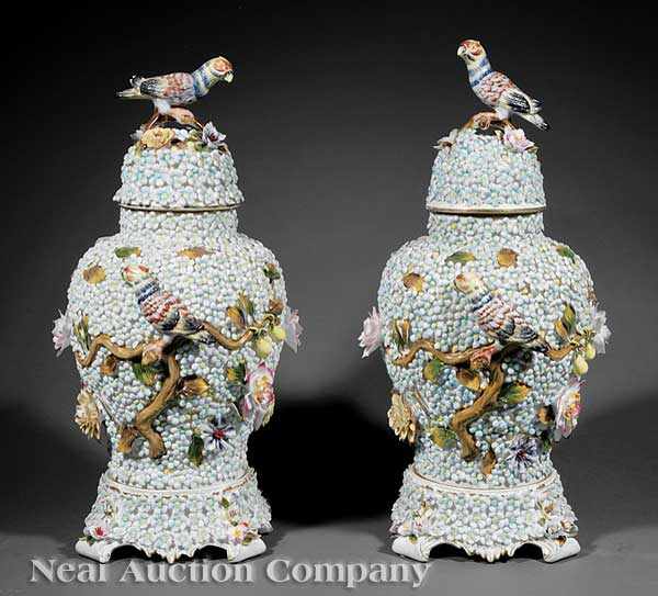 Appraisal: A Pair of Dresden-Style Schneeballen Porcelain Covered Jars the urn-shaped