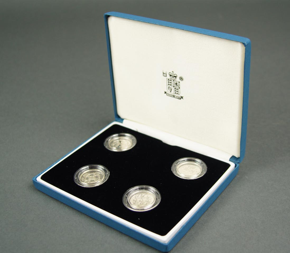 Appraisal: A four silver pound coin collection comprising to pound coins