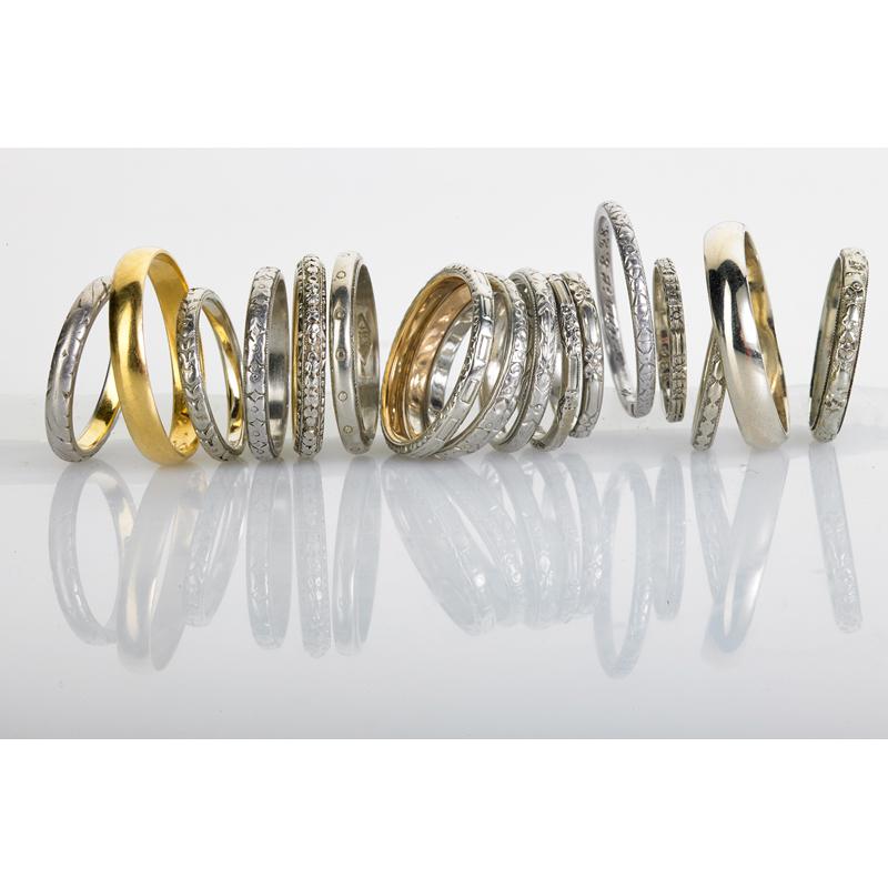 Appraisal: SEVENTEEN PLATINUM OR GOLD BANDS Twelve k wg four platinum