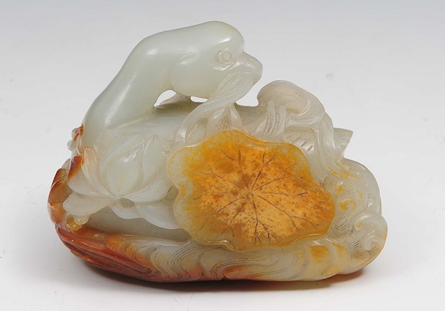 Appraisal: A Chinese white and russet jade carvingQianlong - in the