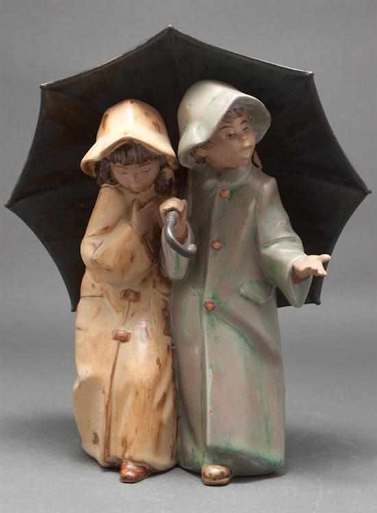 Appraisal: Lladro painted terracotta figural group ''Under the Rain'' no modeled