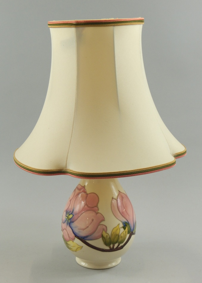 Appraisal: A Moorcroft lamp base with tube lined decoration of pink