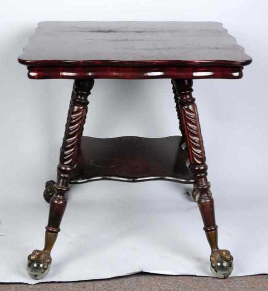 Appraisal: Mahogany Square Scalloped Table With brass feet and large glass