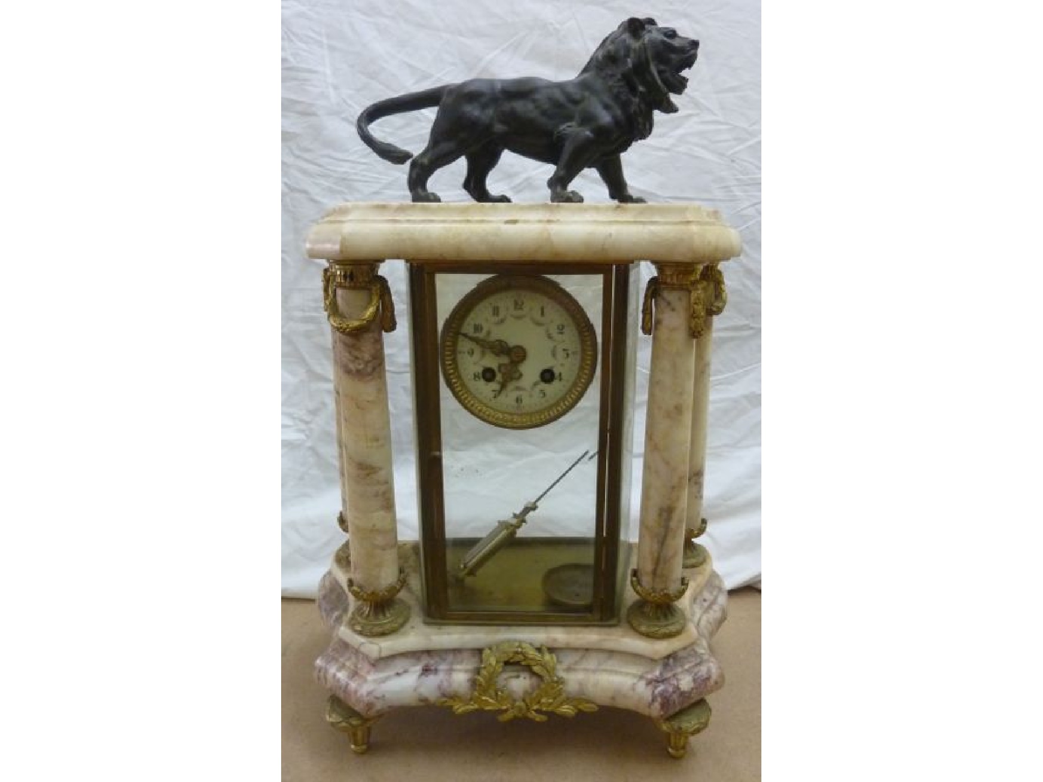 Appraisal: A mid- th century classical portico mantel clock in coloured