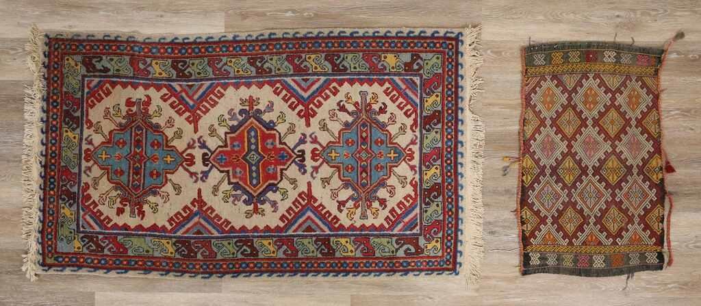 Appraisal: Caucasian style rug and mat Rug with geometric designs and