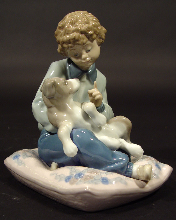 Appraisal: Lladro porcelain figure 'Behave' with hand painted decoration printed factory