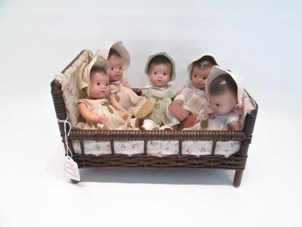 Appraisal: FIVE MADAME ALEXANDER DIONNE QUINTUPLET DOLLS WITH CRIB each doll