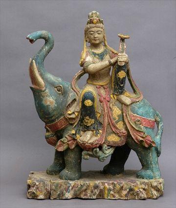 Appraisal: SINO-TIBETAN CARVED POLYCHROME GROUP Carved as Kwan Yin with scepter