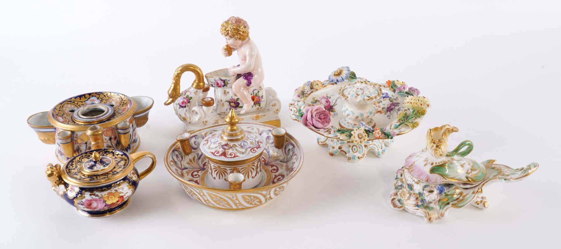 Appraisal: SIX ENGLISH PORCELAIN INKWELLS th century Including a Davenport blue-ground