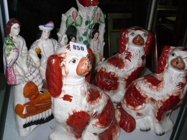 Appraisal: Three Staffordshire ochre ground spaniels and two figural groups