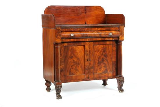 Appraisal: EMPIRE WASH STAND American th century mahogany with flame veneer