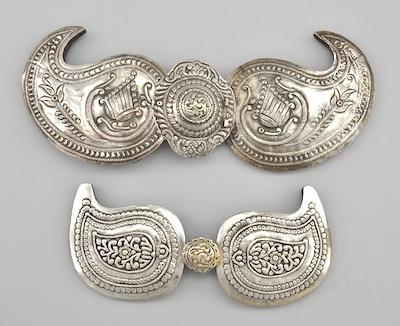 Appraisal: Two Paisley Shape Silver Metal Belt Buckles Large hand chased