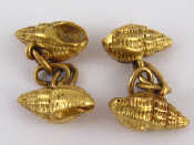 Appraisal: A pair of carat gold cufflinks designed as conch shells