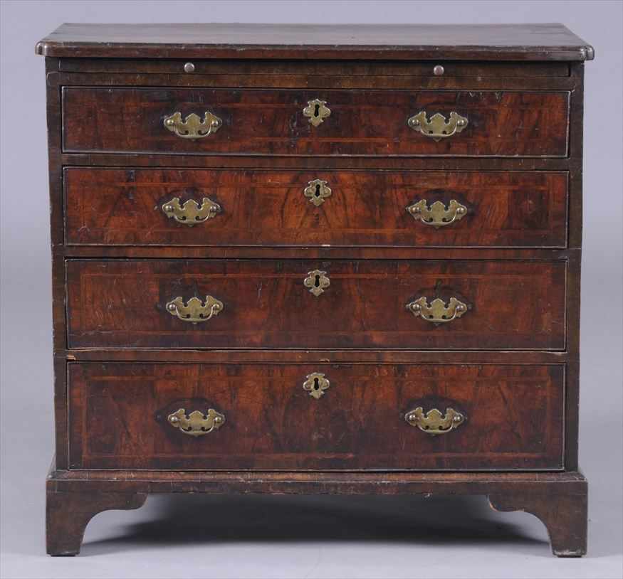 Appraisal: GEORGE I INLAID WALNUT CHEST OF DRAWERS The cross- and