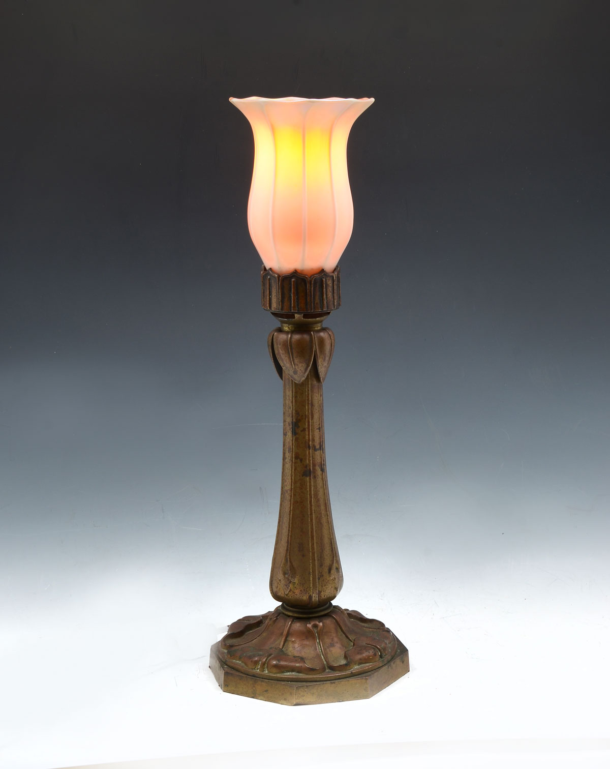 Appraisal: QUEZAL GLASS FLORIFORM TABLE LAMP White with iridescent orange interior