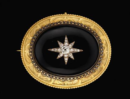 Appraisal: Onyx and diamond starburst brooch victorian Onyx disk set into