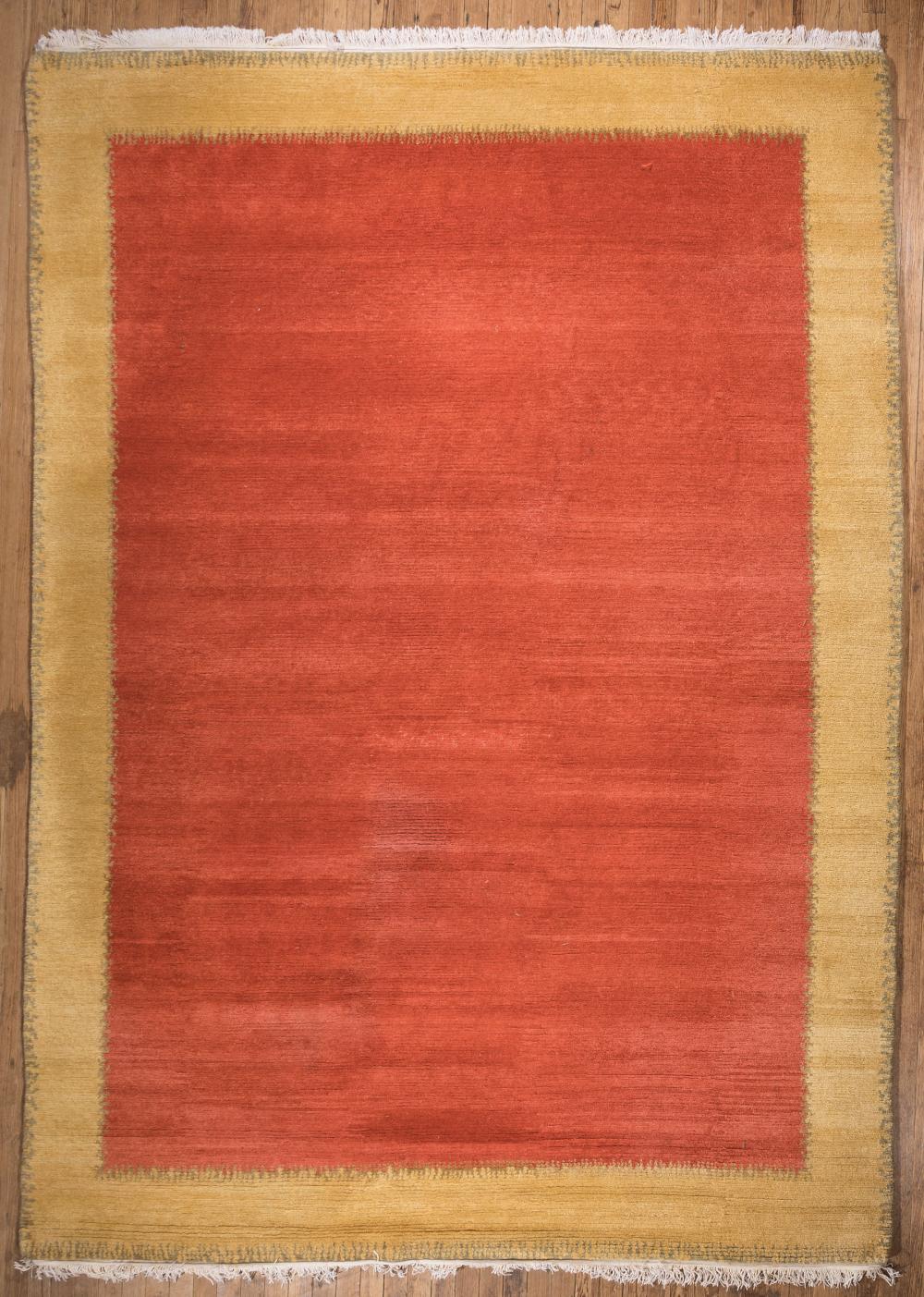 Appraisal: Tibetan Wool Carpet retailed by Odegard salmon ground gold border