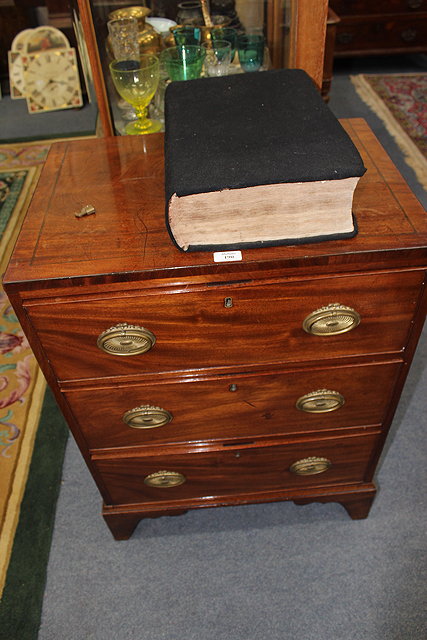 Appraisal: A REGENCY MAHOGANY SMALL CADDY TOP CHEST OF THREE GRADUATED