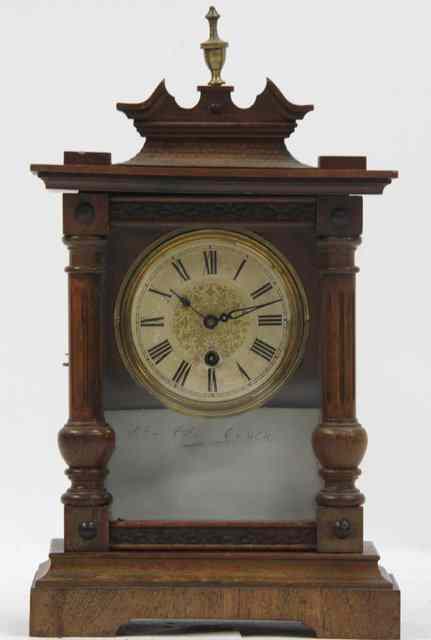 Appraisal: An oak cased mantel clock of architectural form cm high