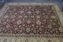 Appraisal: A large Tabriz style wool carpet cm long cm wide