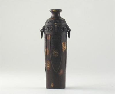 Appraisal: A Chinese bronze cylindrical vase cast with formal lappets and