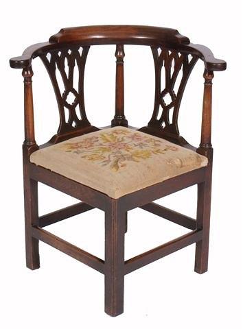 Appraisal: A GEORGE III MAHOGANY CORNER CHAIR with twin pierced splats